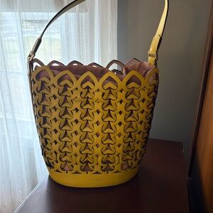 kate spade Yellow Laser-Cut Bucket Shoulder Bag with Pink Lining